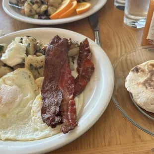 2 eggs  w/  bacon n potatoes. Yummy