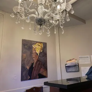 Guest check in with a picture of Marie Laveau