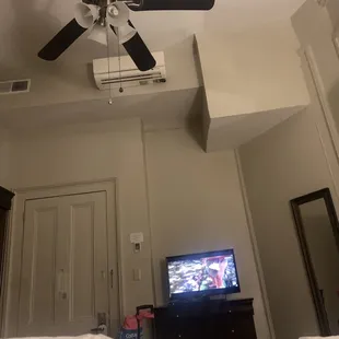 View of high ceiling, AC unit