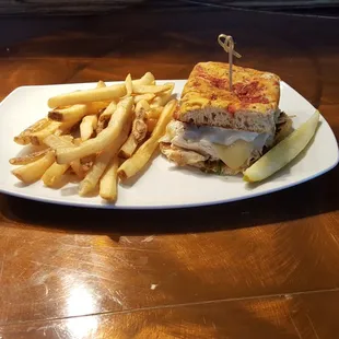 Turkey sandwich with roasted aioli, pea shoots, white cheddar served on focaccia.