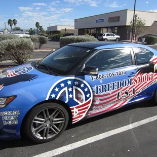 Vehicle wrap for Freedom Smoke USA.