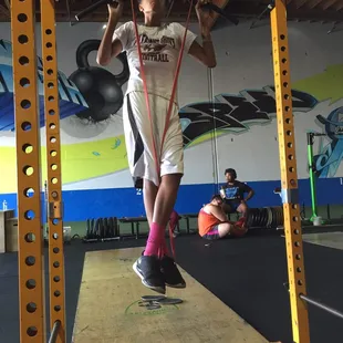 The man-child knocking out some pull-ups...