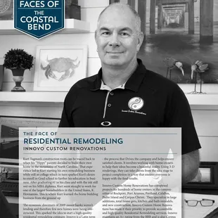 a black and white photo of a man in a black polo shirt