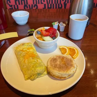 Custom omelet with fruit instead of potatoes.