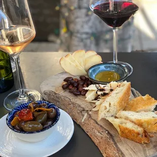 Happy hour cheese plate and olives