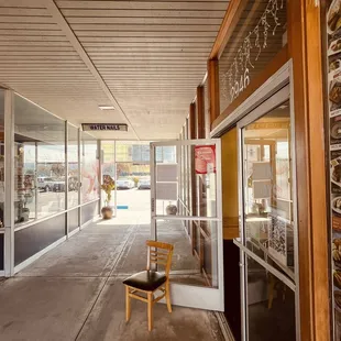 a chair in front of a store