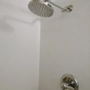 Shower head and water control, purchased at other local home improvement stores.