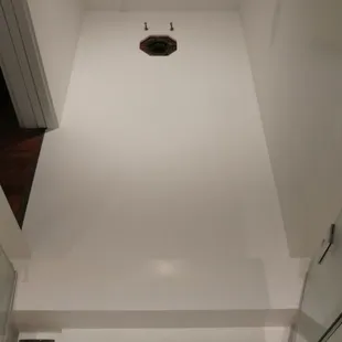 Floor with hole for toilet. Konrad even made screw holes that the plumber asked for.