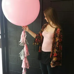 36" balloon with tail of tassels. Tassels can be customized to your colors.