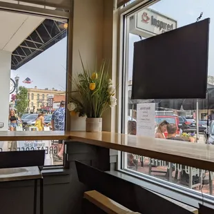 a view of a city street through a window