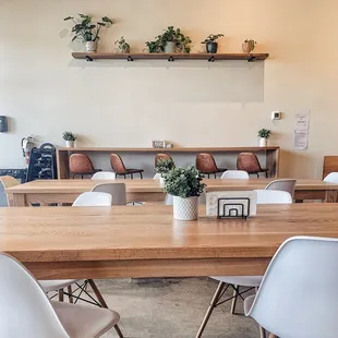 a wooden table and chairs
