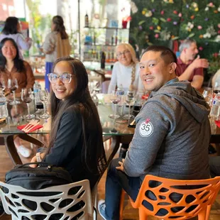 a group of people sitting at a table