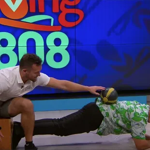 Living808 host Mikey Monis. Use a heel reference (ie. wall) and a light weight on your lower back to press into to increase ab recruitment!