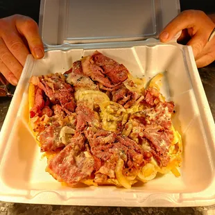 Huge pastrami sandwich. Eat it there, it&apos;ll sog up quick.
