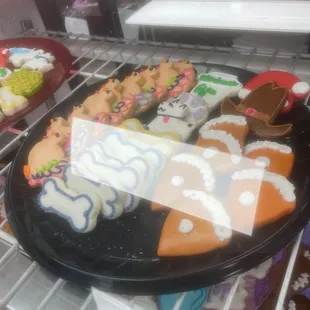 a variety of decorated cookies