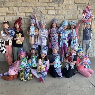 Girl Scouts make Fleece Hats and Scarves for themselves, plus a set for a child in need.