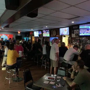 a crowd of people watching a game