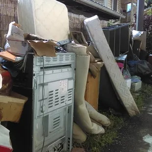Trash is constantly piled up like this, and was when our housing specialist did her &quot;inspection&quot; and deemed this place OK for her clients.