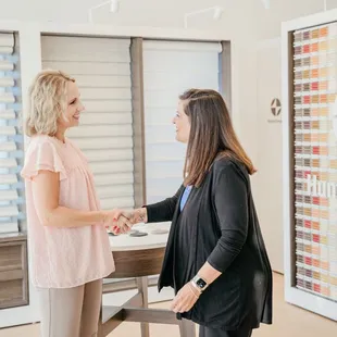 Client and designer in showroom