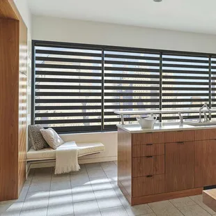Designer Banded Shades in bold black create a statement, cut glare, and then close for room darkening and privacy.