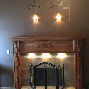 Fireplace upgrade with custom oak mantel