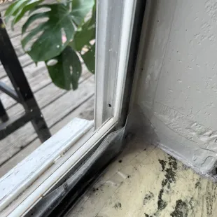 Packing tape to fix window... already coming off too