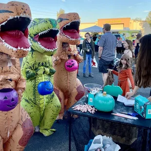 Trick-or-treaters enjoying a fun night of allergy-safe meals, live music, and a petting zoo put together with the help of Intentional Foods