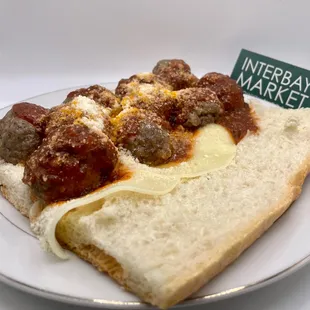 meat and cheese on bread