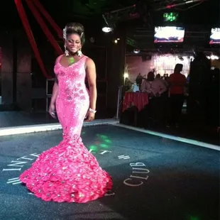 a woman in a pink dress