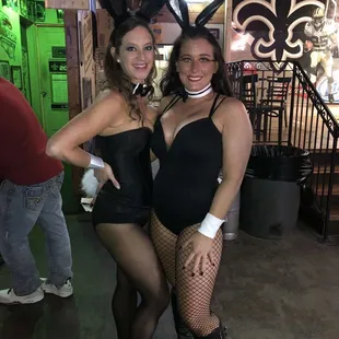 two women dressed up in bunny costumes