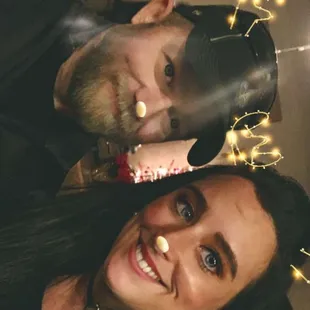 a man and a woman posing for a picture