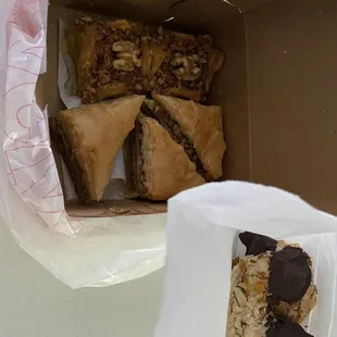 Robin&apos;s nest baklava, triangle baklava, and almond crescent dipped in chocolate