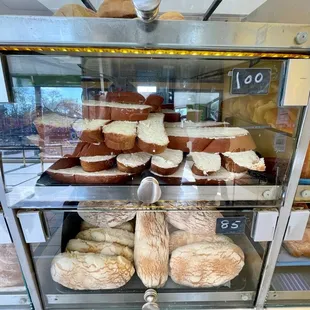 a display case filled with donuts