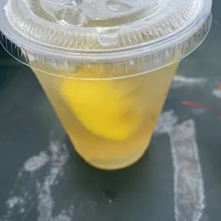 Lemon tea drink (cold) with lemon and sugar