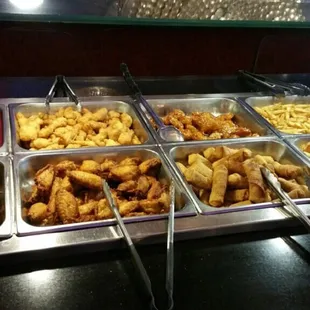 Fried buffet bar with chicken wings, chicken on stick, etc