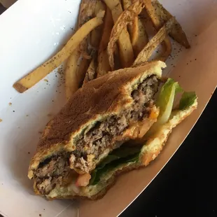 Over cooked and charred burger