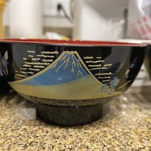 a close up of a bowl on a counter
