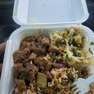 Curry goat  and beans and rice