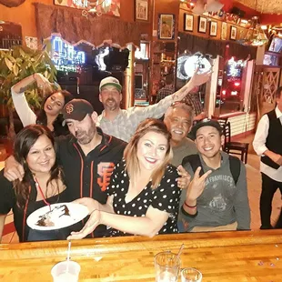a group of people posing for a picture