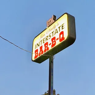 a neon sign for a restaurant