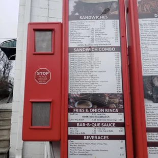 menus on a red vending machine