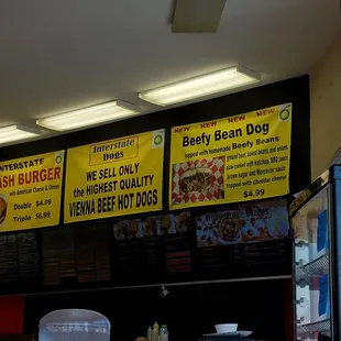 menus on the wall above the counter