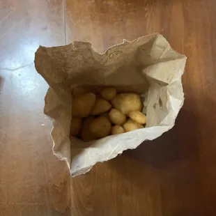 a bag of potatoes on a table