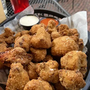 a basket of fried chicken nuggies