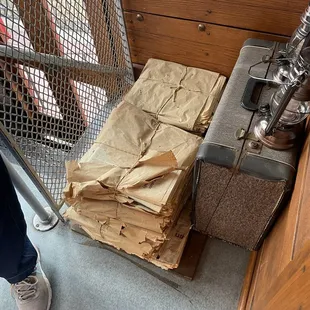 Stack of newspapers inside the train