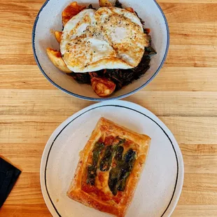 two plates of food on a wooden table