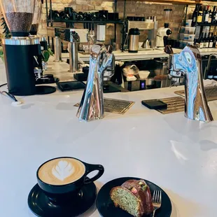 a plate of food and a cup of coffee