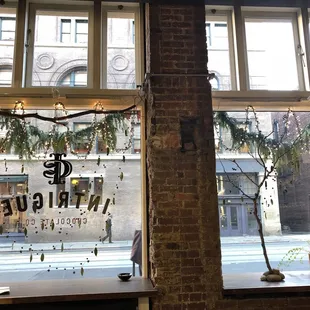 Xmas deco and view of the street from tasting counter.