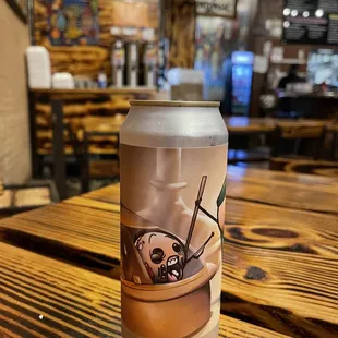 a can of coffee on a table