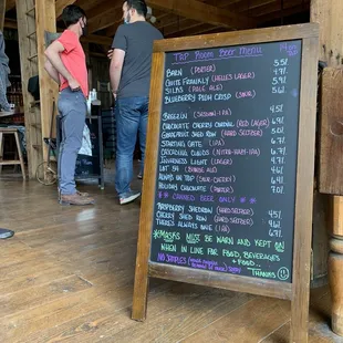 Beer list inside barn bar